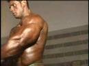Bodybuilder Paco Bautista pumping b ...